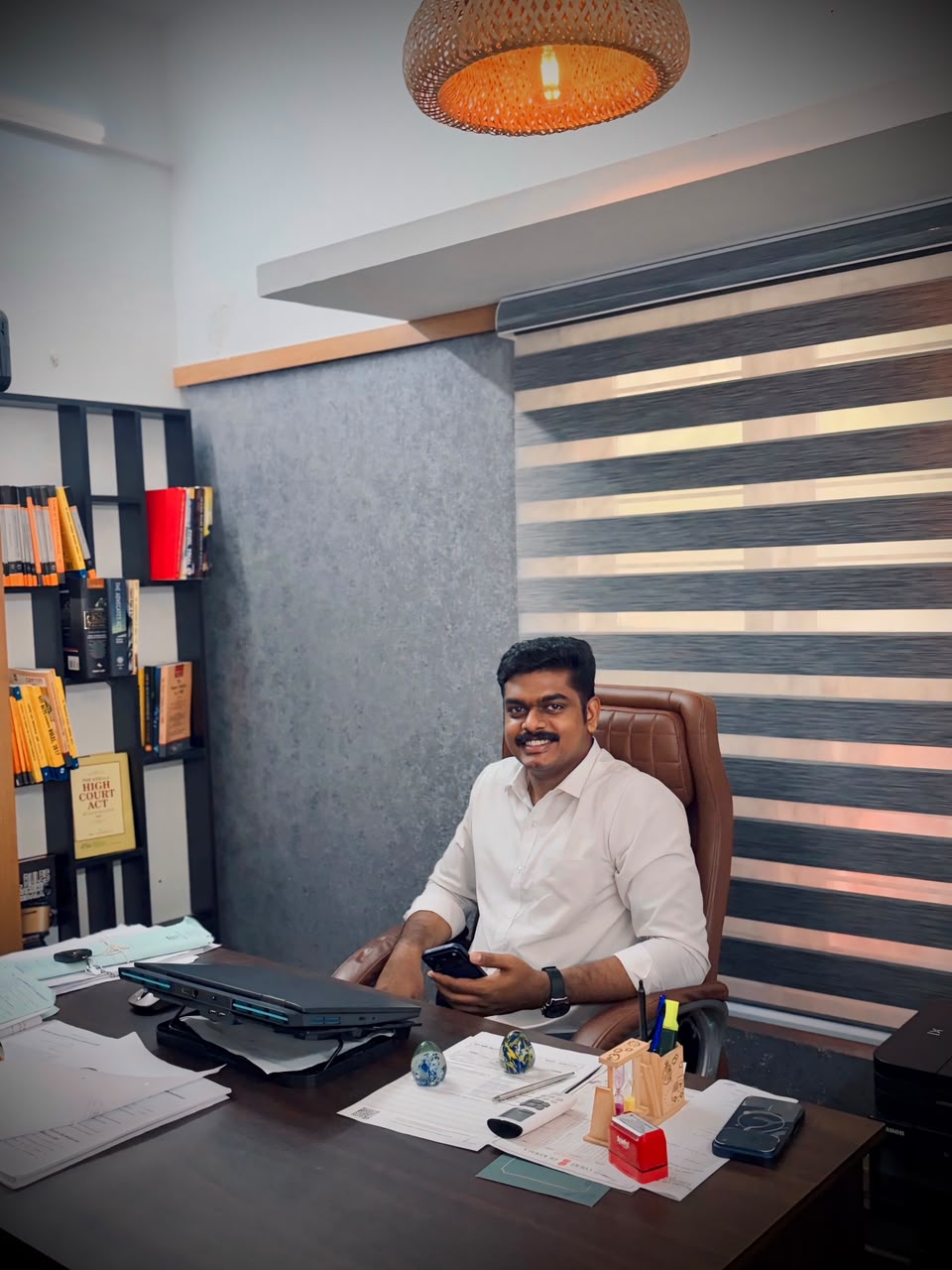 Advocate seated at the office desk